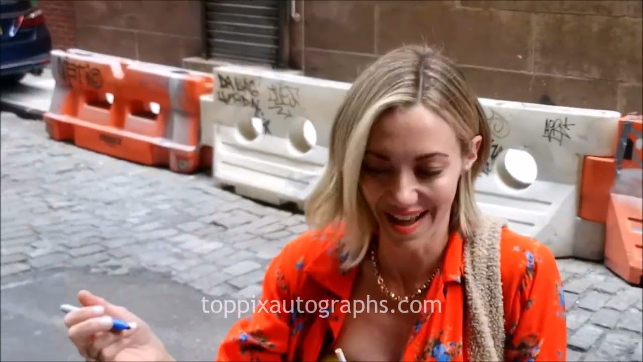 Megan Stevenson signs autographs for TopPix