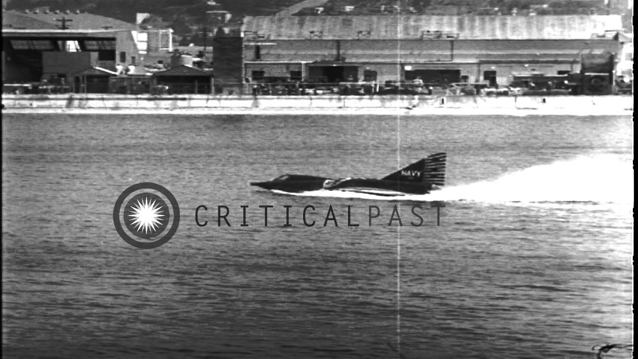 Seaplane fighter aircraft F2Y Sea Dart comes to a halt and taxis on water during ...HD Stock Footage