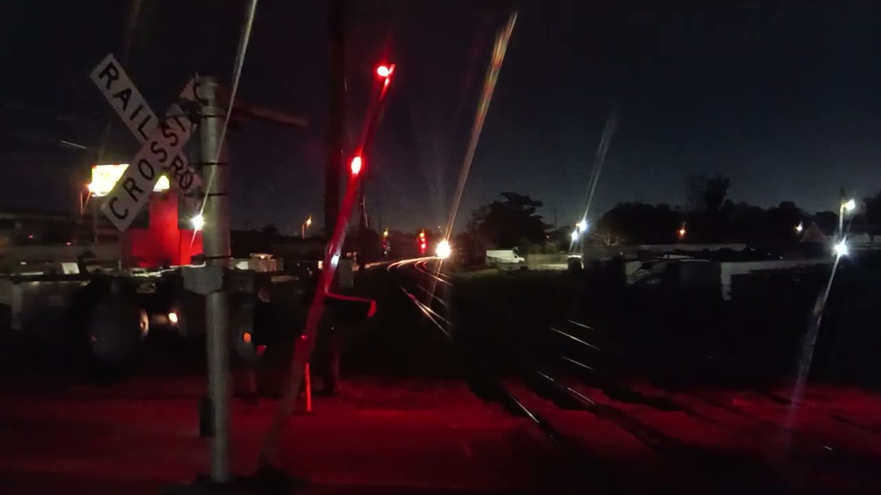 CN leaves CN Mays yard with Illinois Central 1027 trailing second heading to NS oliver yard.