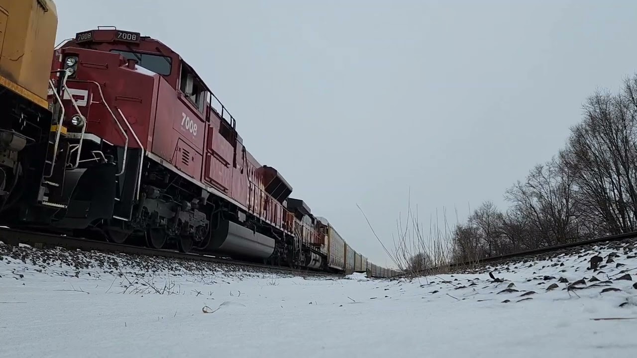 CP SD70ACU leads very colorful consist