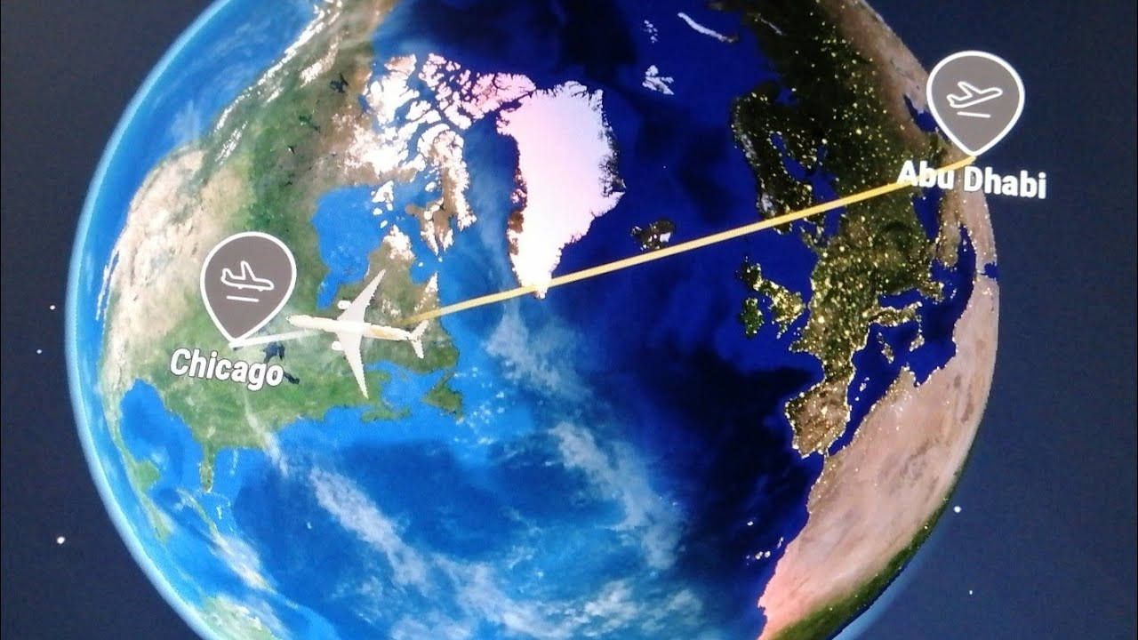 USA trip with Sean. How far is it from Abu Dhabi, United Arab Emirates to Chicago, USA?