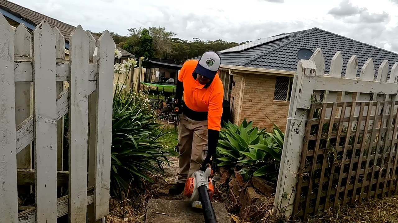 Mowing an overgrown yard
