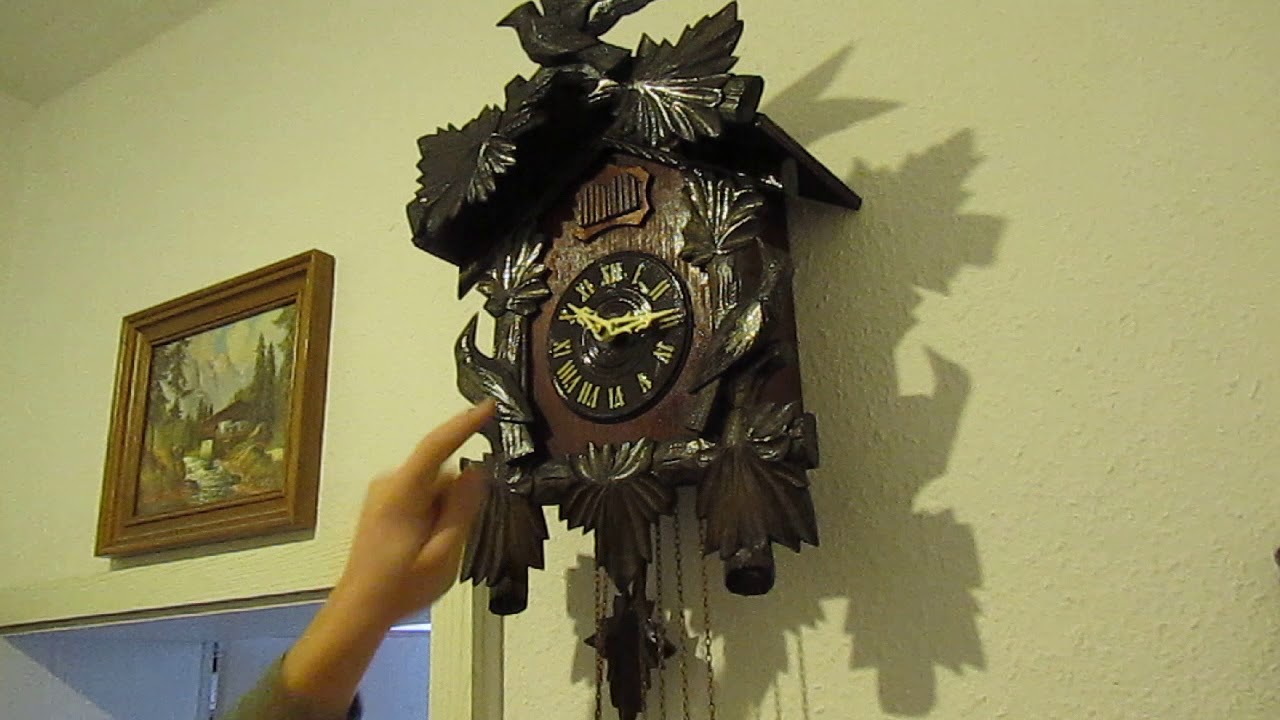 Kuckucksuhr mit Wachtelruf und Kuckuck (vergreister Kuckuck)