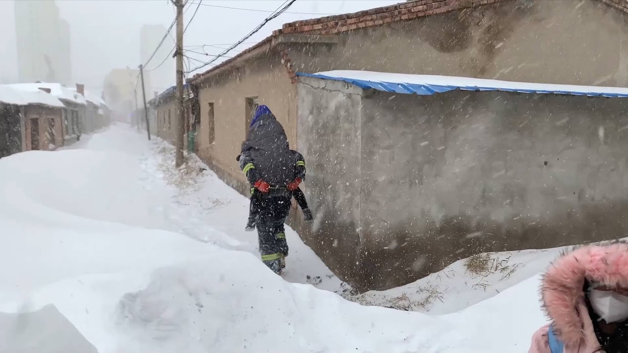 Firefighters rescue five trapped in blizzard-hit house in NE China
