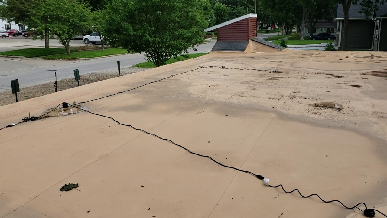 Inexpensive option to drain ponding water from a flat roof.
