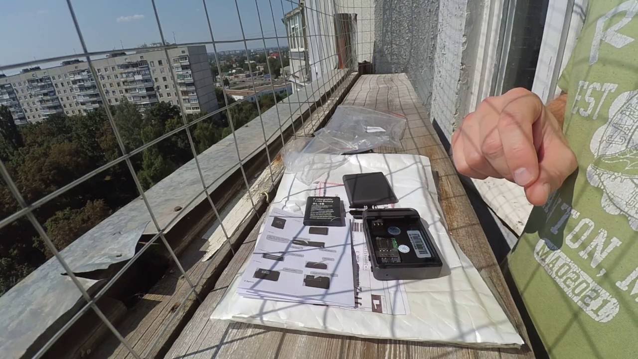 Unpacking GPS tracker TK102B and battery discharge alarm