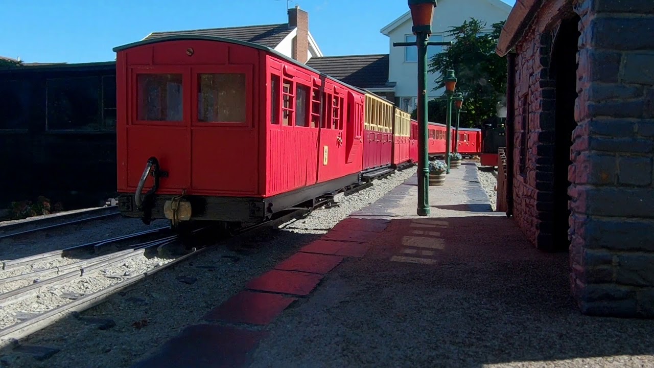 Arrivals and departures on a 16mm scale garden railway