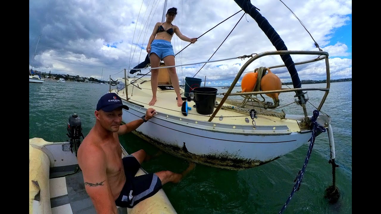 Cleaning a sailboat hull full of MUSSELS !! AND our Mainsail has holes in it ! #sailboatrestoration