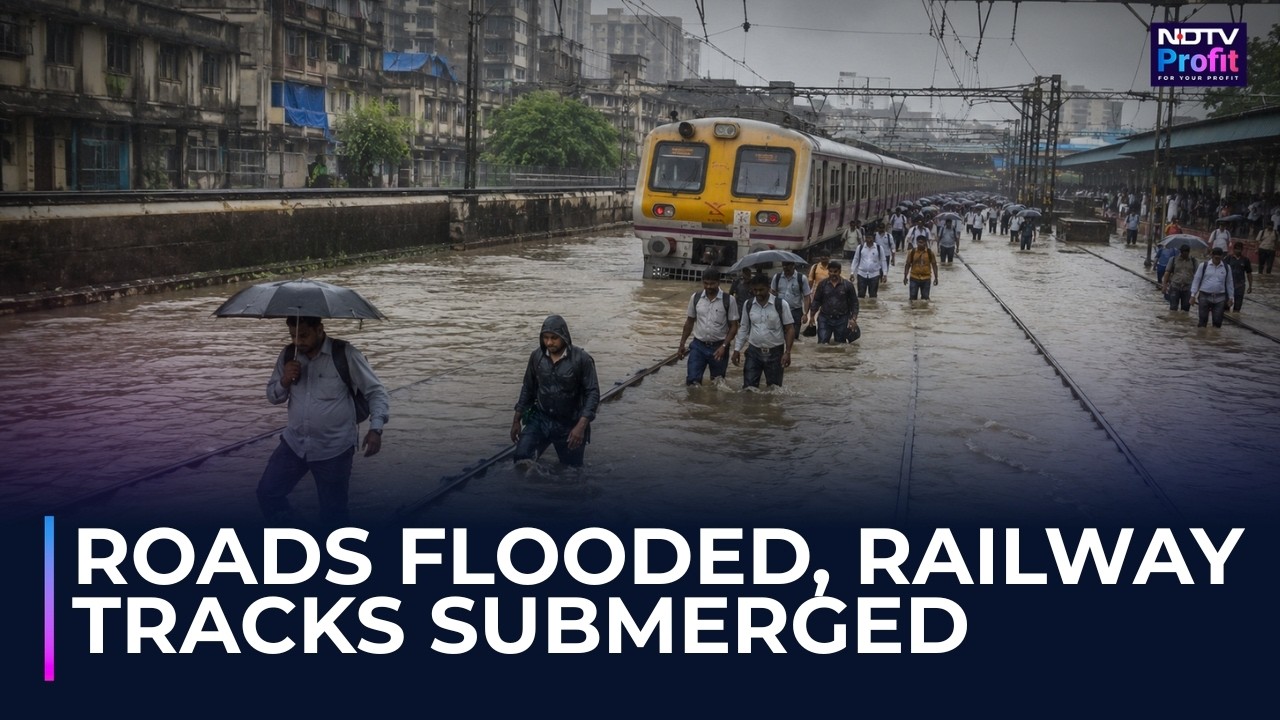 Heavy Rains Drown Mumbai: Commuters Wade Through Knee-Deep Water, Railway Tracks Submerged