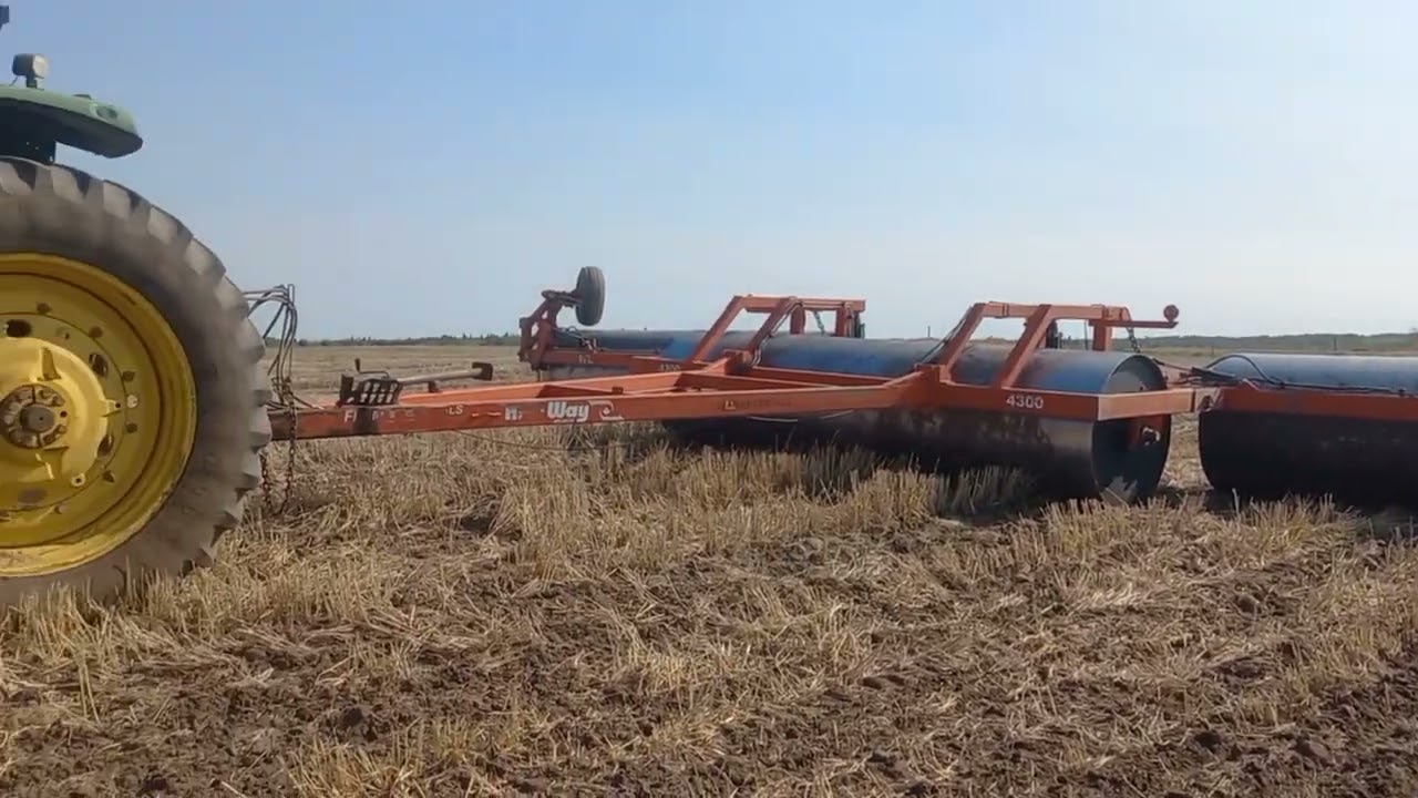 JOHN DEERE 6170 R PULLING FLAMAN RENTALS 4300 LAND ROLER