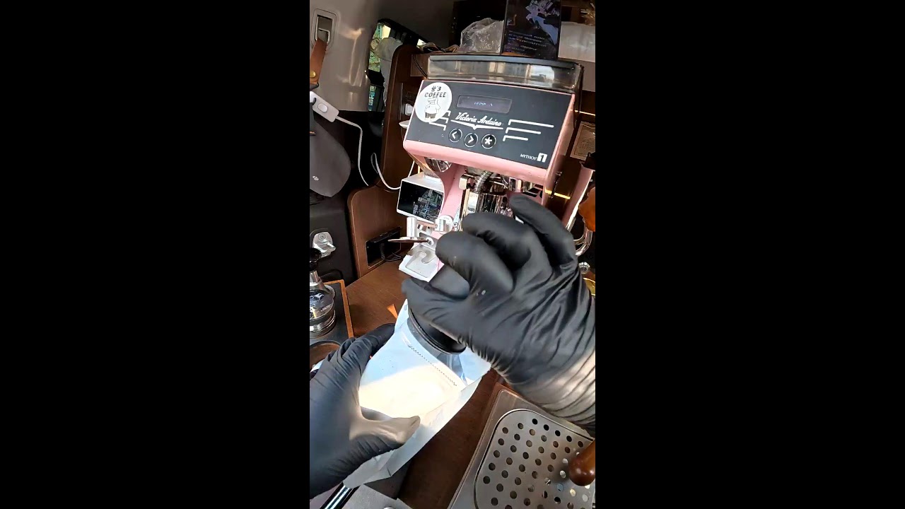 Soaking up the sun, drinking coffee.