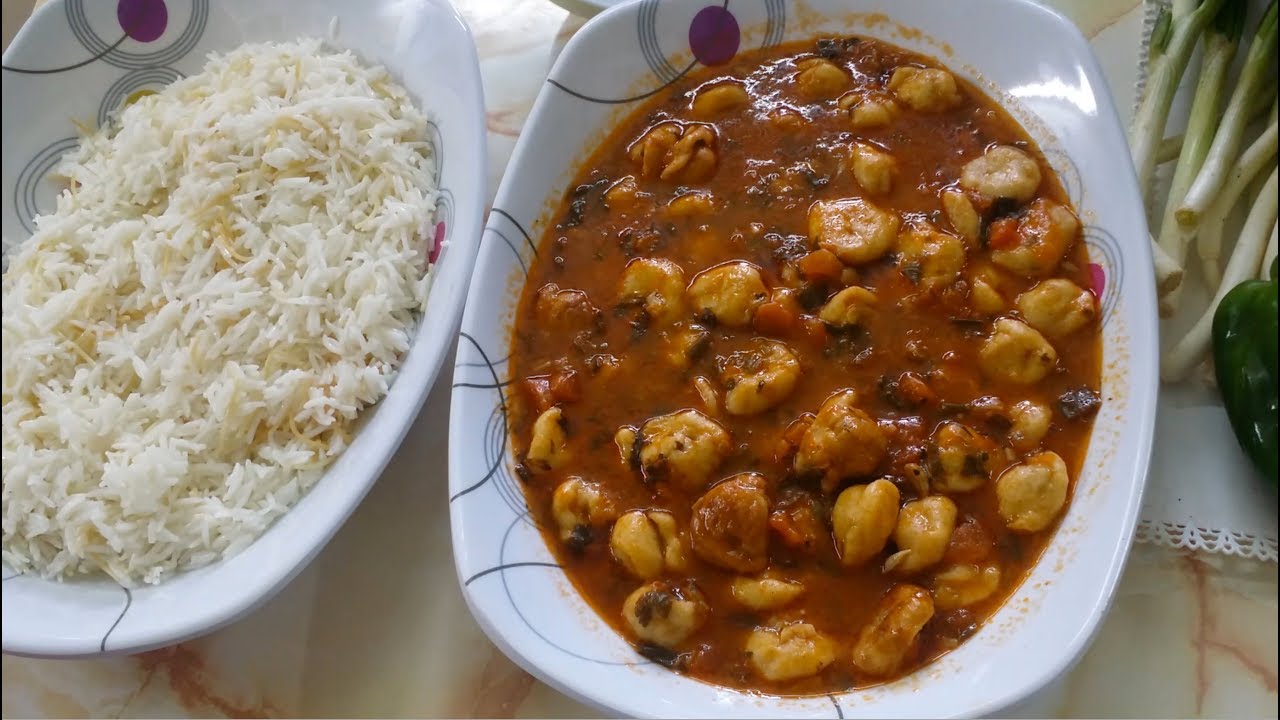 ششبرك بصلصة البندورة  Shishbarak with Tomato sauce
