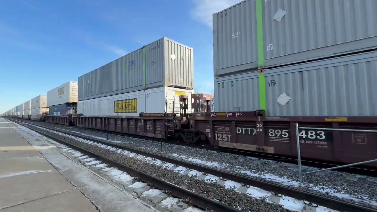 BNSF Intermodal Freight Train at Westmont Station, with Metra Train in the Background 