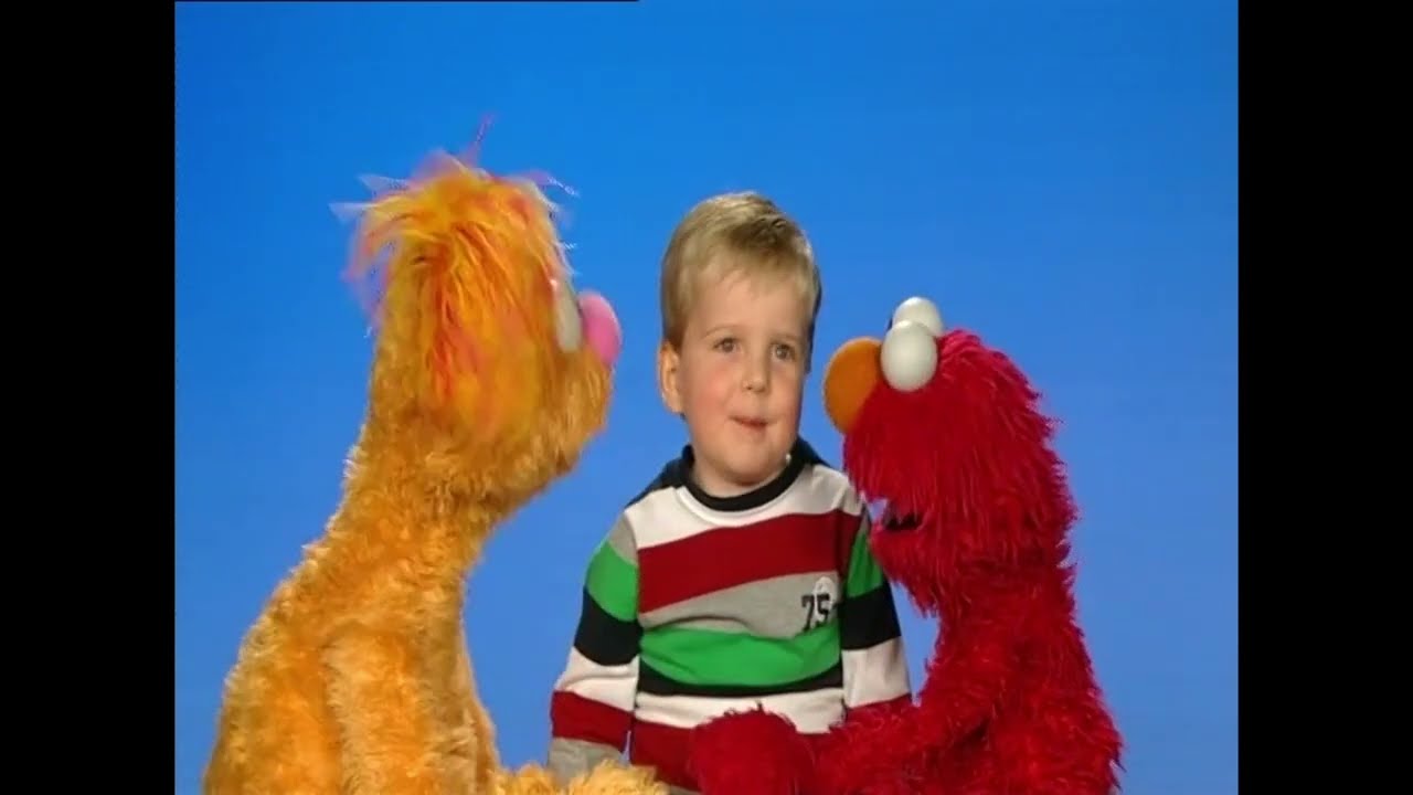 Ollie and Elmo Sharing