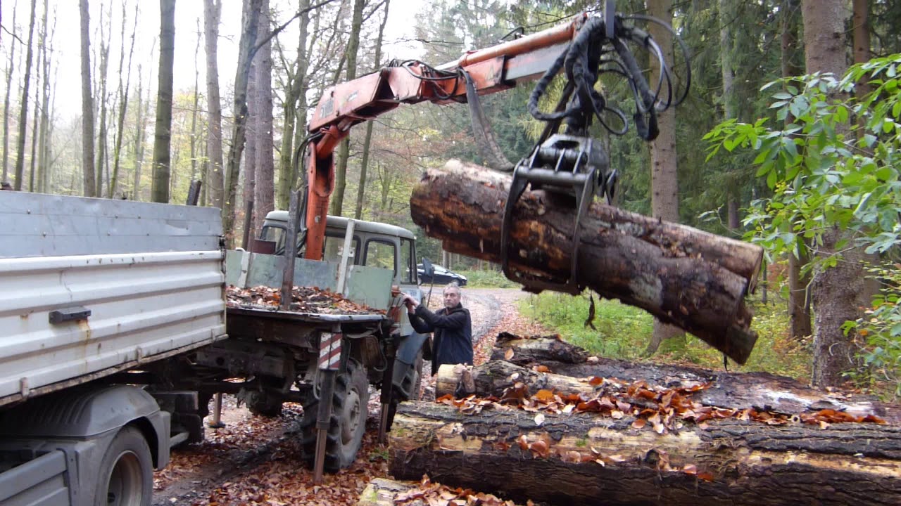 OPTIMOG 20171026 Unimog 406 HIAB Holz laden