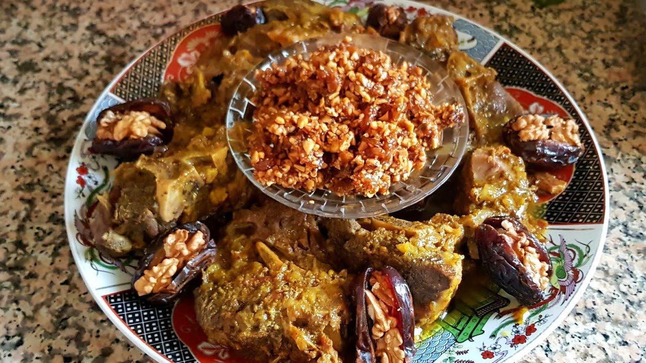 اللحم ديال الاعراس بكمية صغيرة مع المفرشخ الزبيب و اللوز  معسلين من روائع الطبخ المغربي
