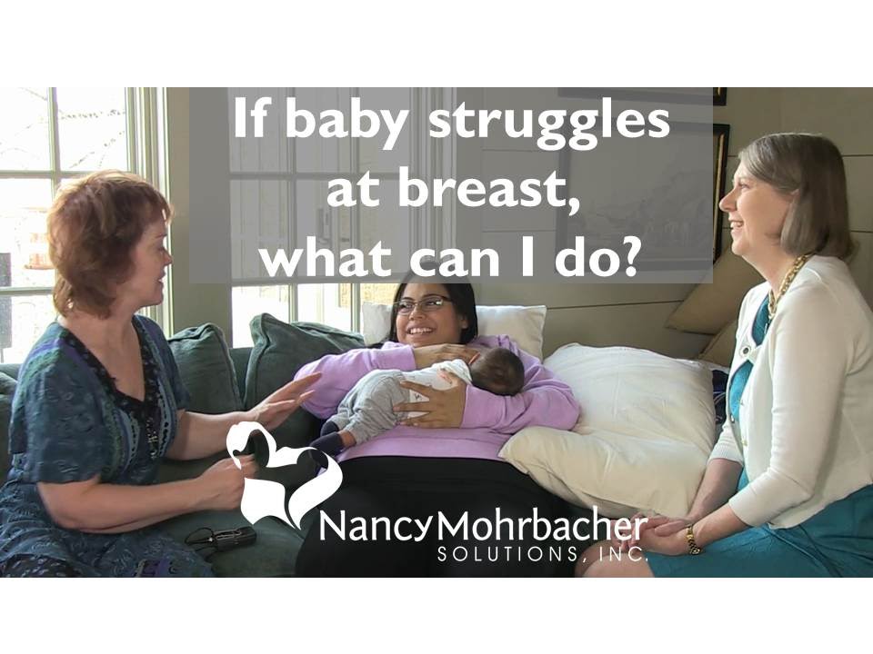If baby struggles at breast, what can I do?