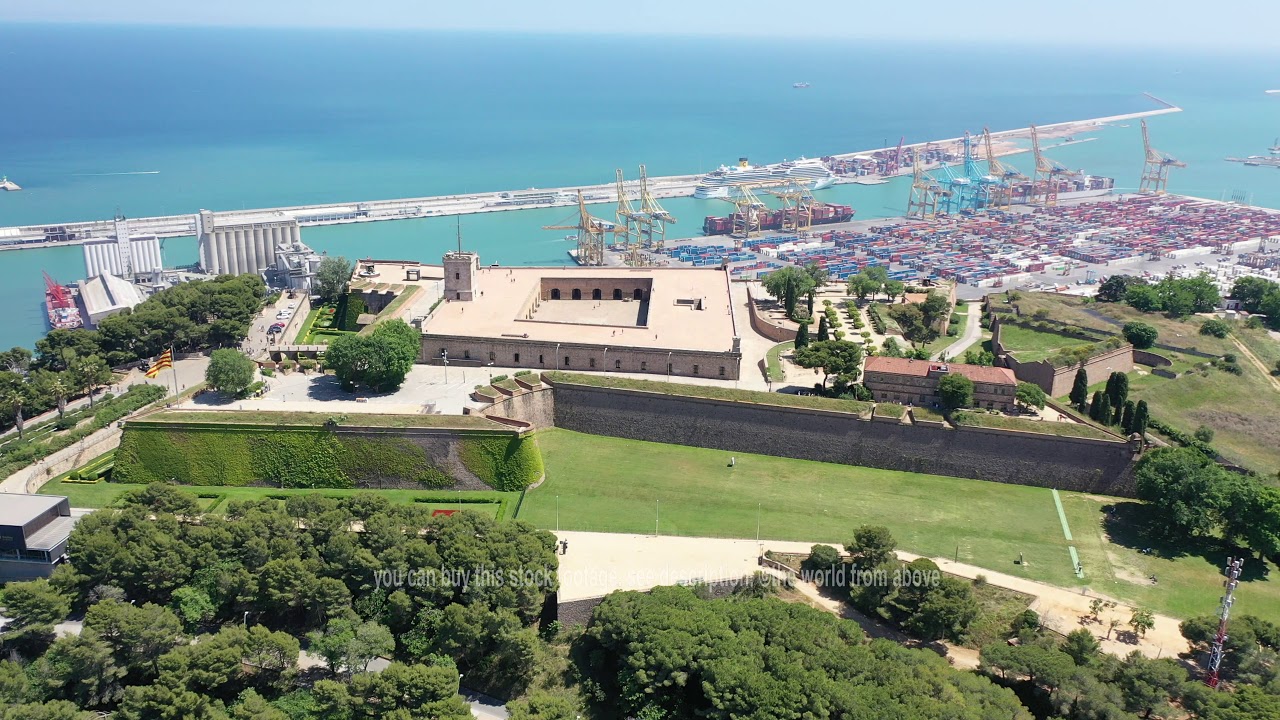 Aerial Stock Footage: Flying with Drone over Castell de Montju&iuml;c in City Barcelona | 4k
