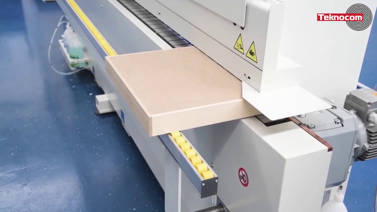 Olimpic K 560 - односторонний кромкооблицовочный станок