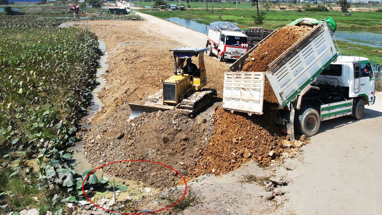 Nicely Road Construction Completed 100% Corner ￼by Bulldozer Komatsu D31P with 5T dump truck