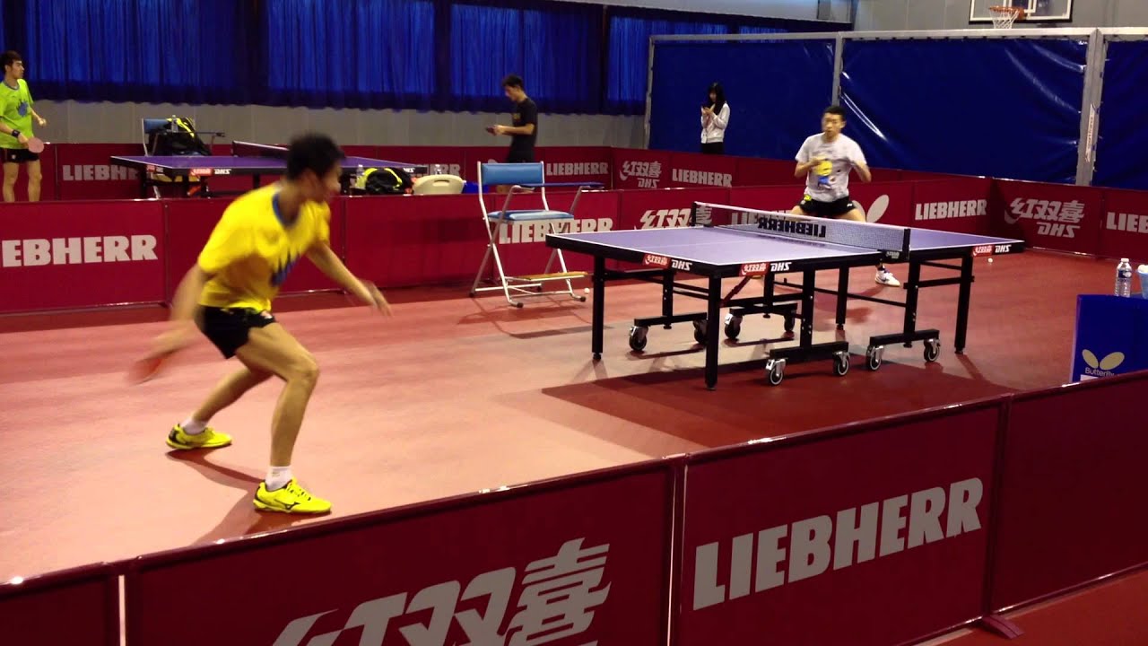 STIGA star Xu Xin practising with Wang Liqin