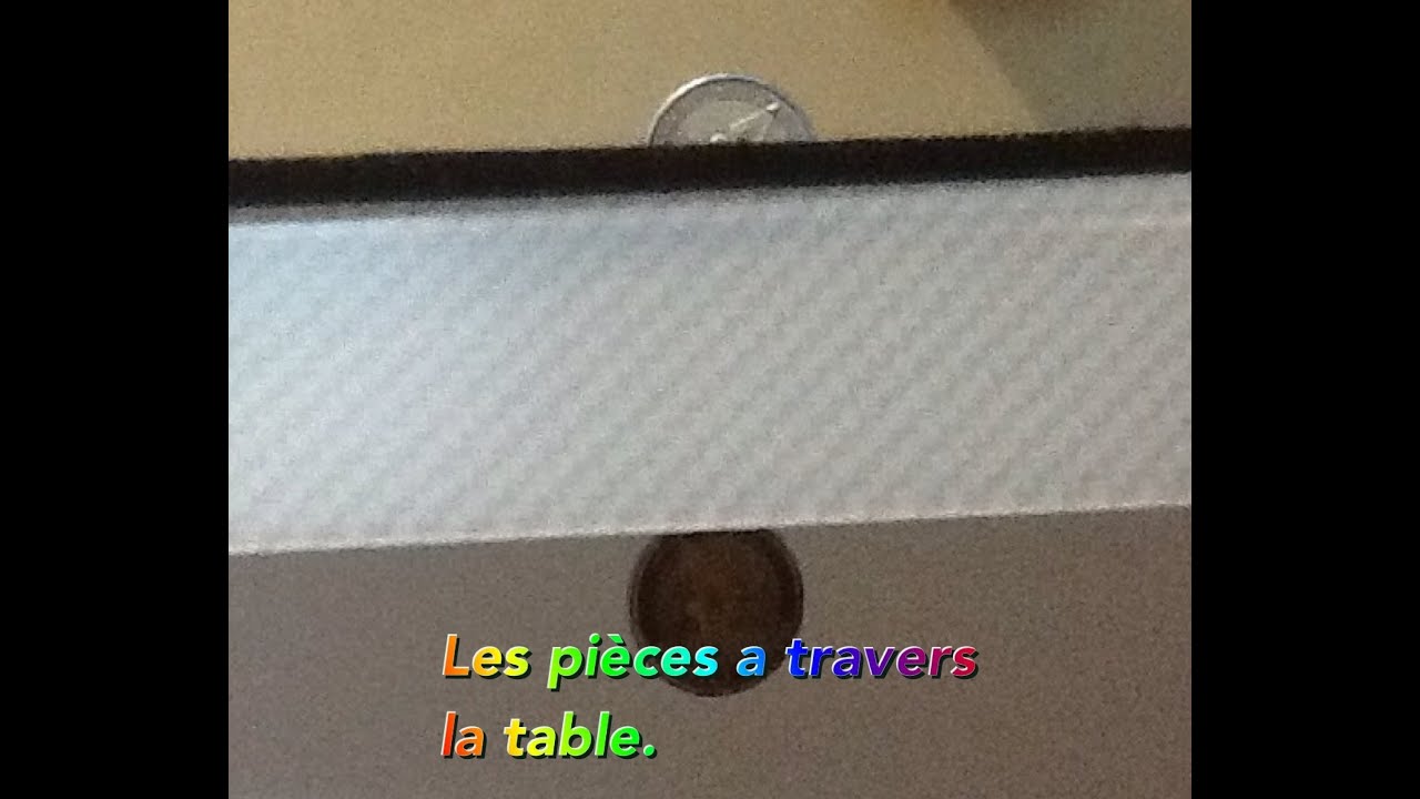 [MAGIE]EXPLICATION  piece a travers la table