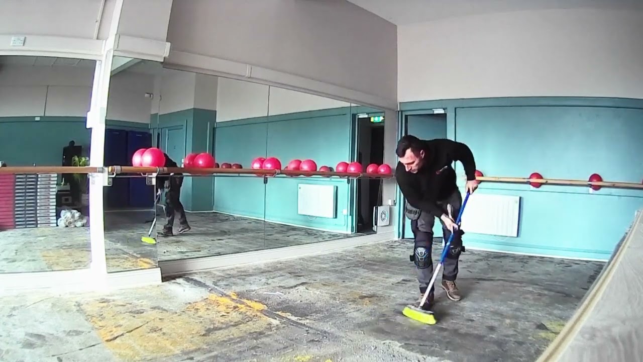 Preparing subfloor for laminate flooring, commercial job