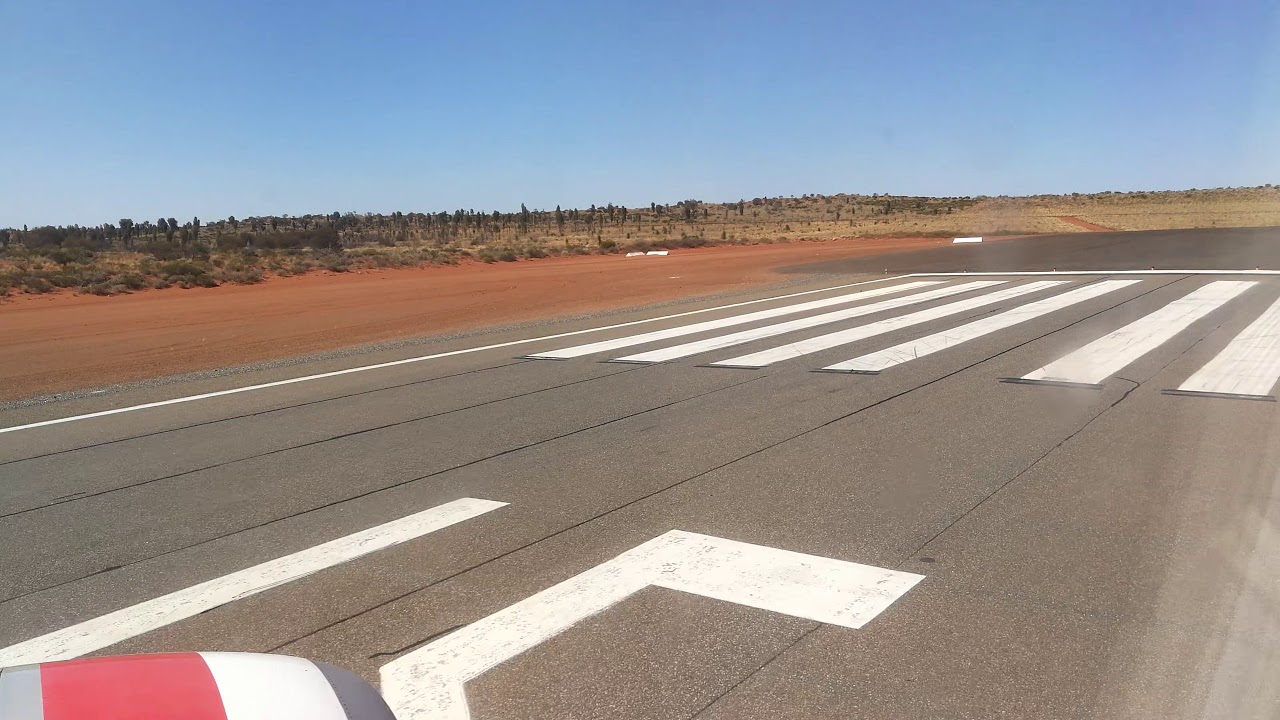 Virgin Australia landing at Ayers Rock airport (AYQ), Uluru.