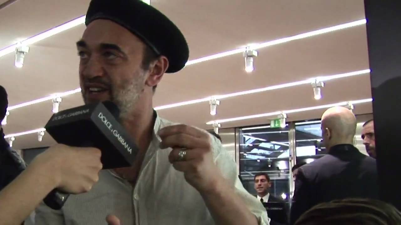Eugene talks hair backstage at Dolce&Gabbana Winter 2011 mens show
