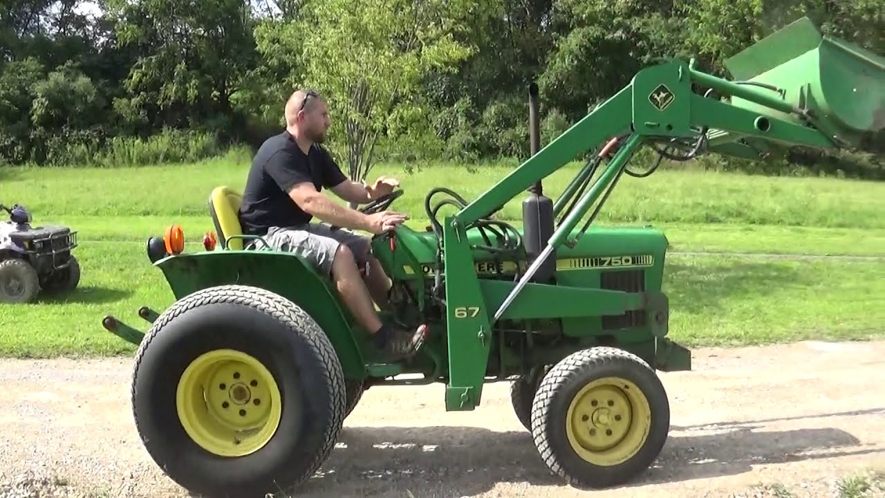 JOHN DEERE 750 TRACTOR WITH LOADER