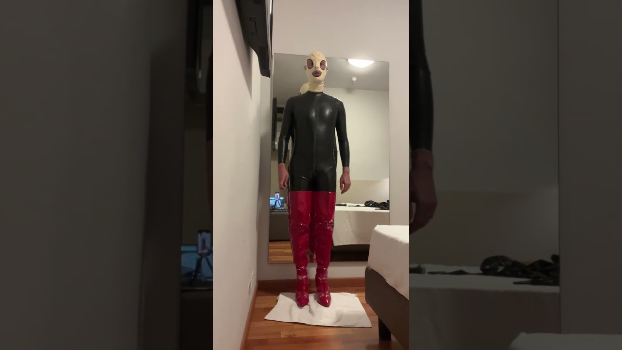 White mask, black catsuit and red long boots #latex #redboots #catsuit #latexhood #latexman