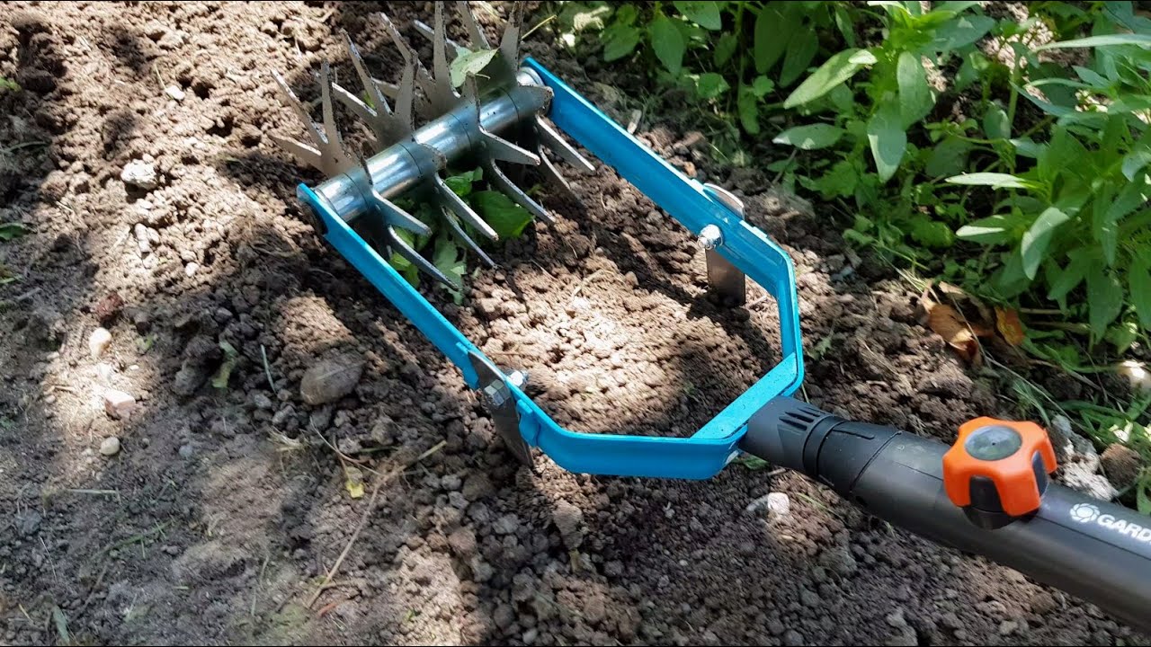 Prășitoare manuală cu afânător pentru sol | Gardena COMBISYSTEM | Star Tiller and Weeding Knife Head