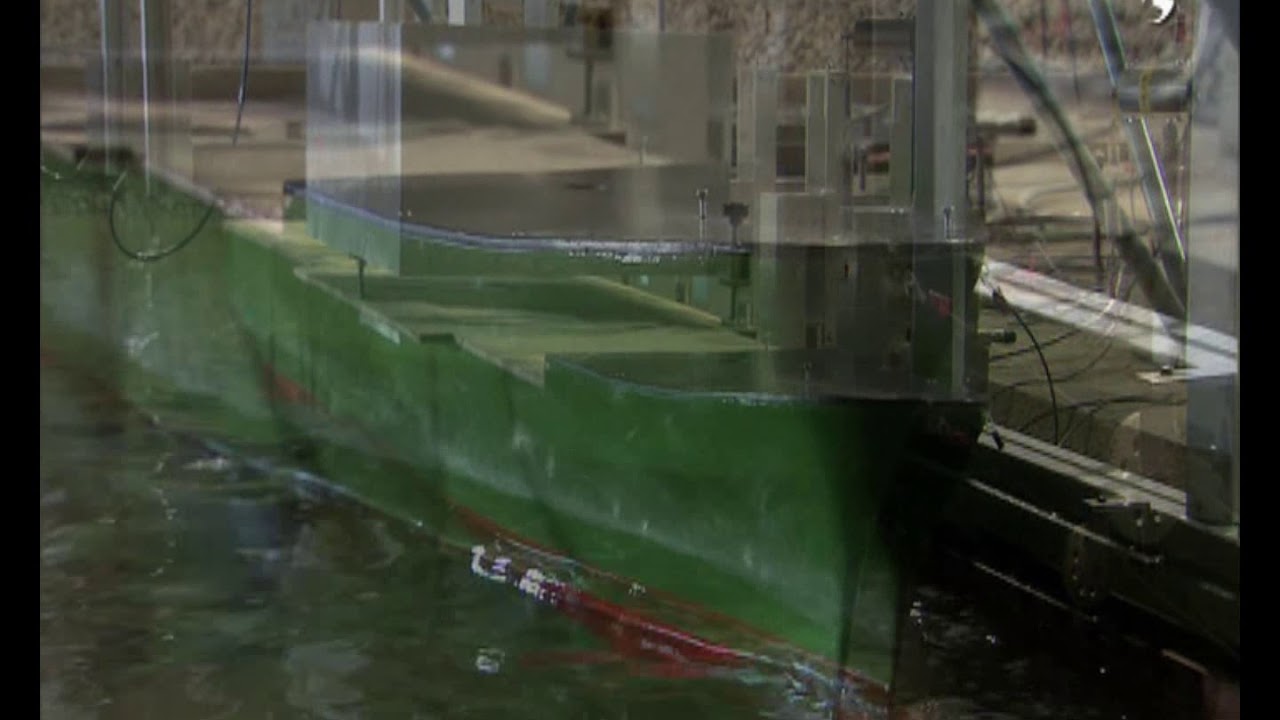 Physical modelling of moored ship motion and harbour resonance
