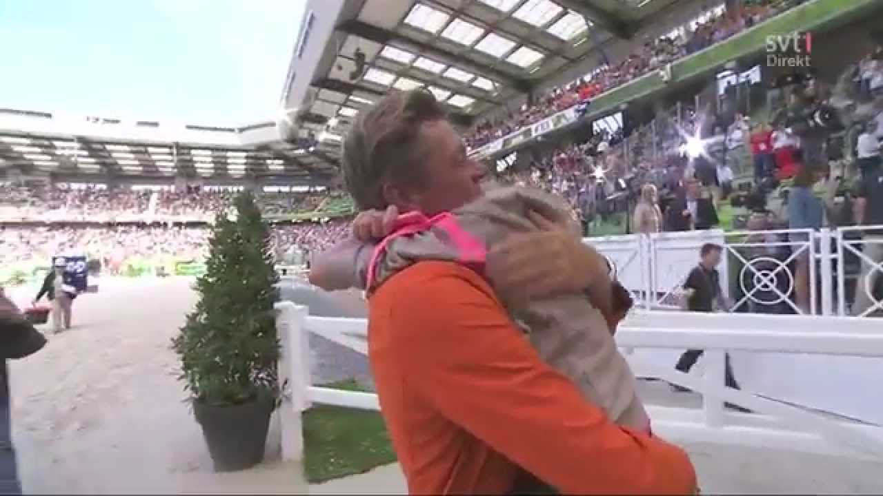 Jeroen Dubbeldam with daughter celebrating the World Champion title
