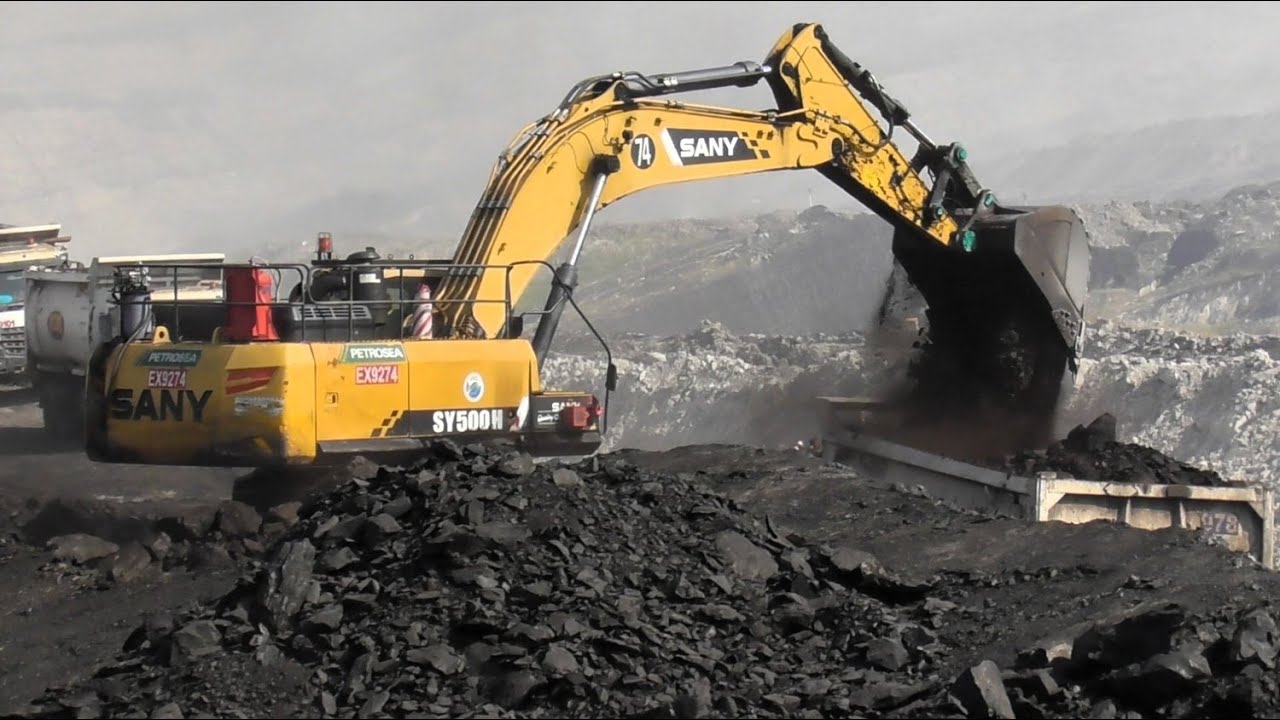 SANY SY500H Excavator Loading Coal Material On Trucks - Coal Mining Operations