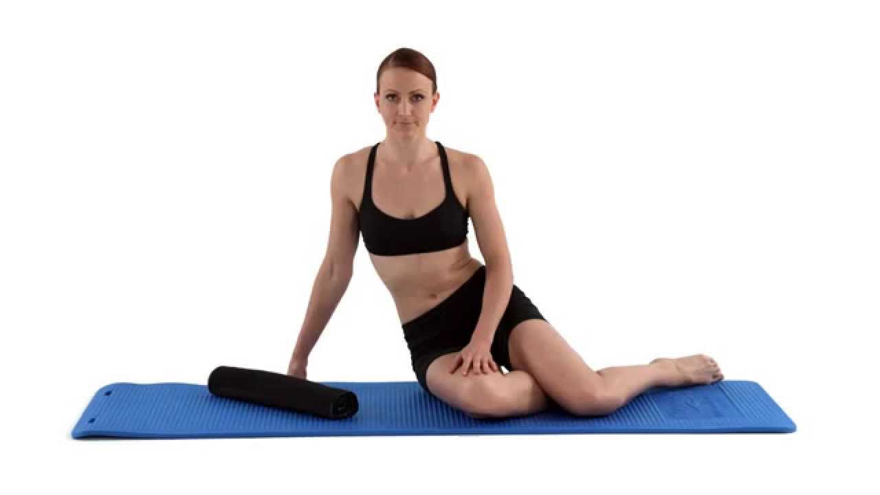 Thoracic extension stretch with towel exercise
