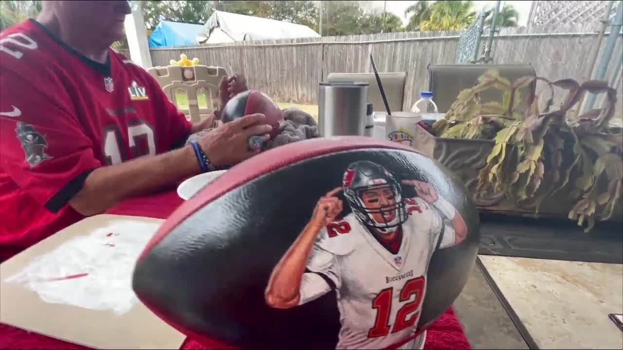 Local artist paints Gronk, Brady's face on footballs and wants to give them to the Super Bowl Champs