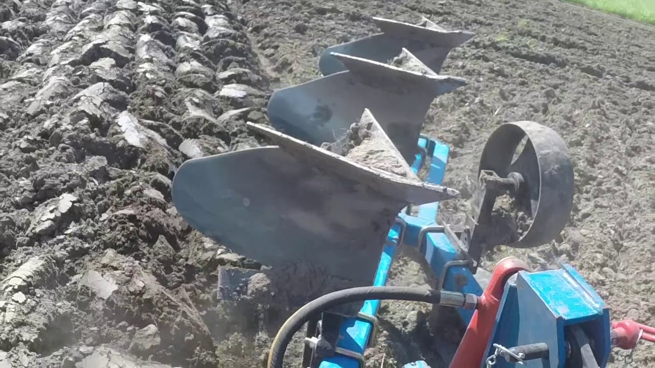New Holland Boomer 50 Plowing