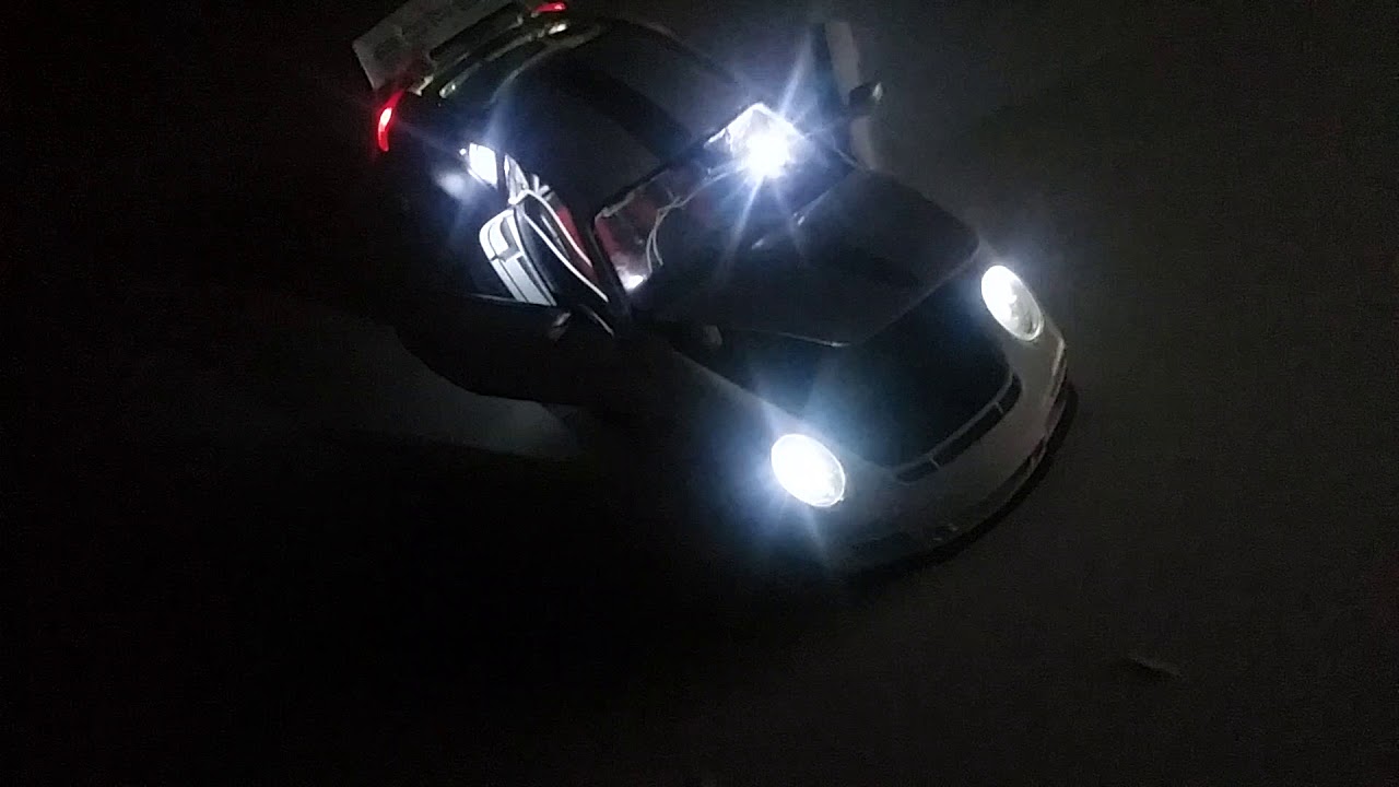 Porsche rs 40 a escala 1.18 led