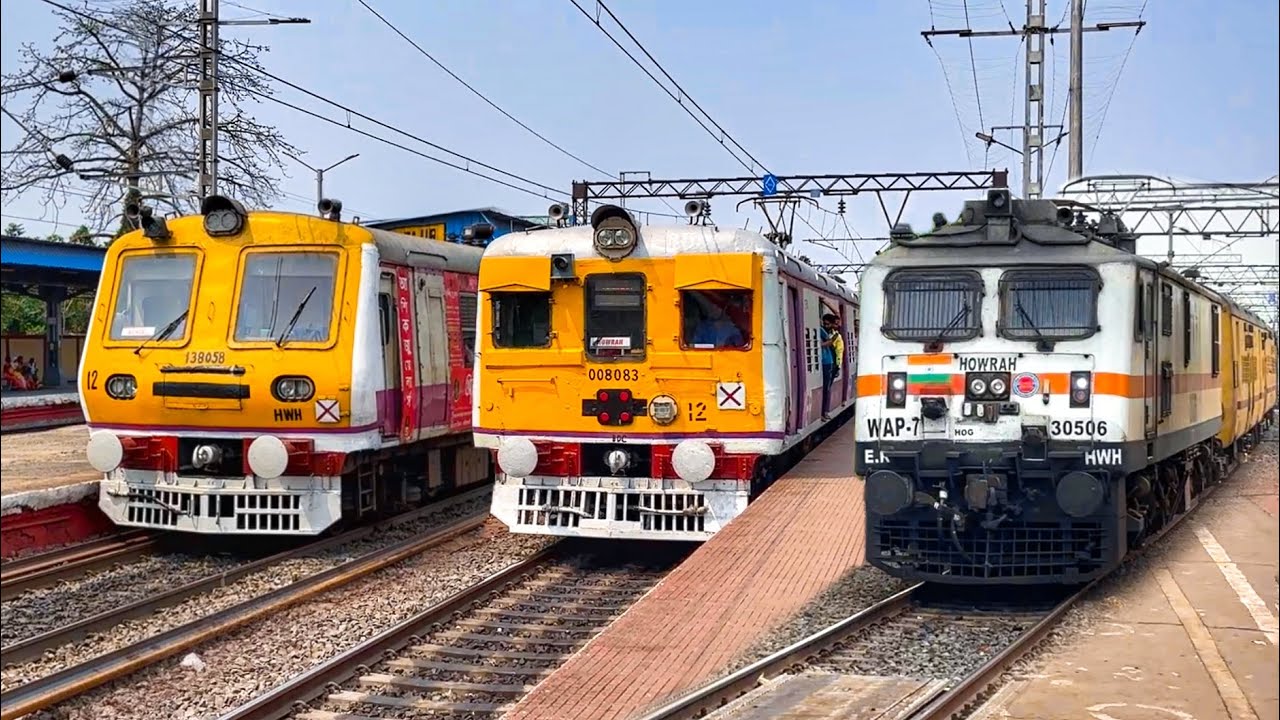 Early morning Crowded trains crossing action spotted at busy Belur railway station.