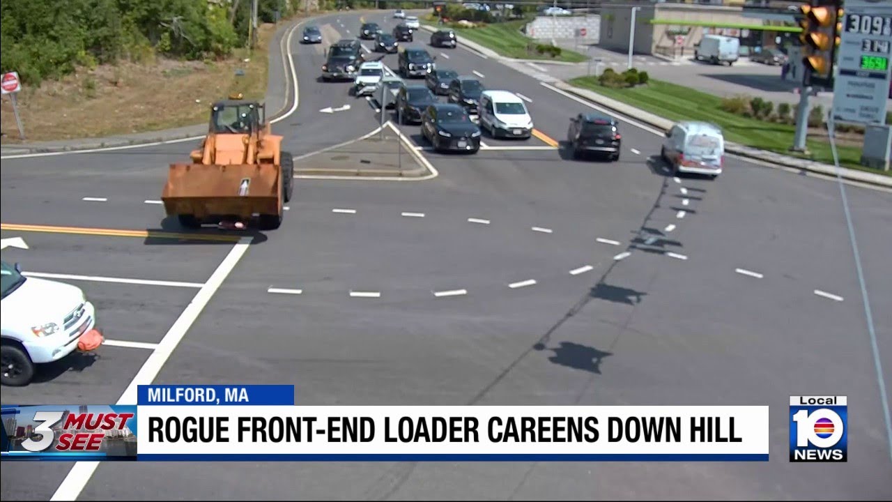 Heavy construction vehicle barres into traffic