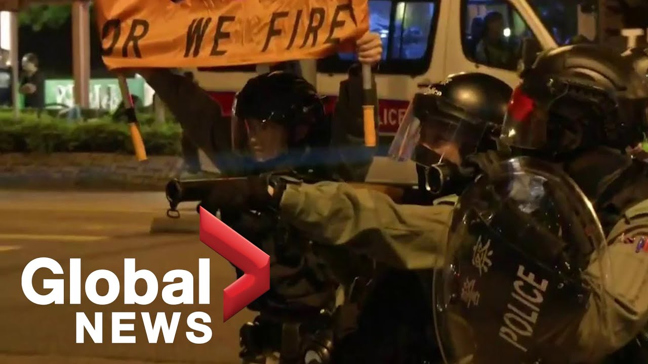 Hong Kong riot police confront protesters in Tseung Kwan O suburb