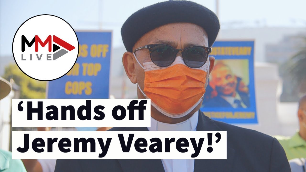 'Bring back Vearey!': Supporters march to parliament after top cop's dismissal