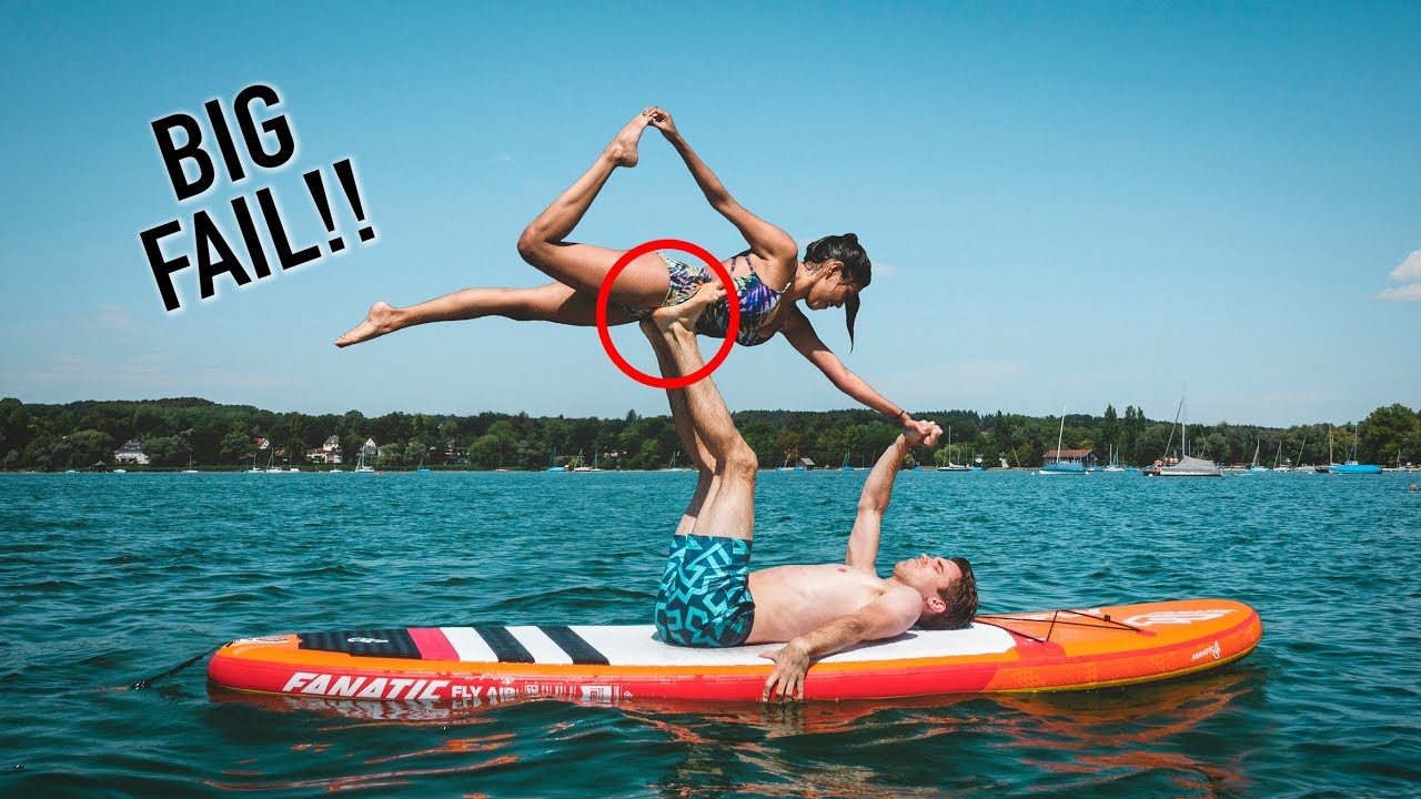 COUPLES YOGA CHALLENGE ON A PADDLE BOARD!! (EXTREME)