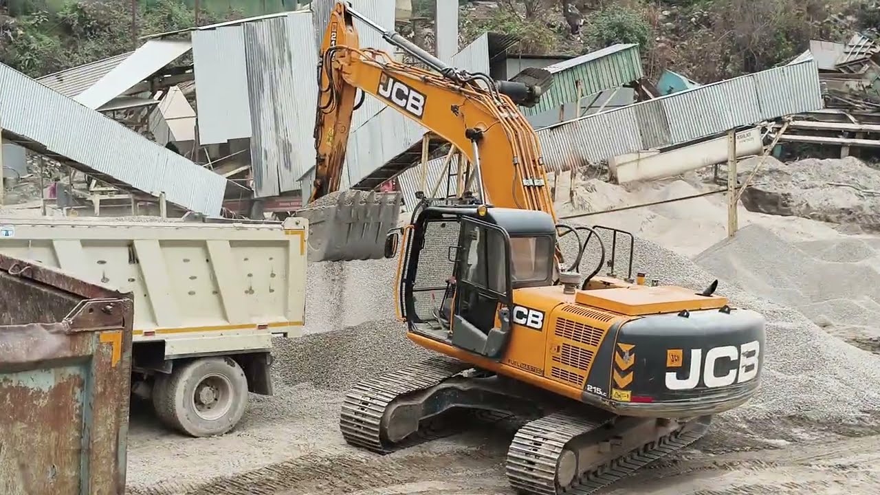 JCB excavator machine truck loading in 20 mm material