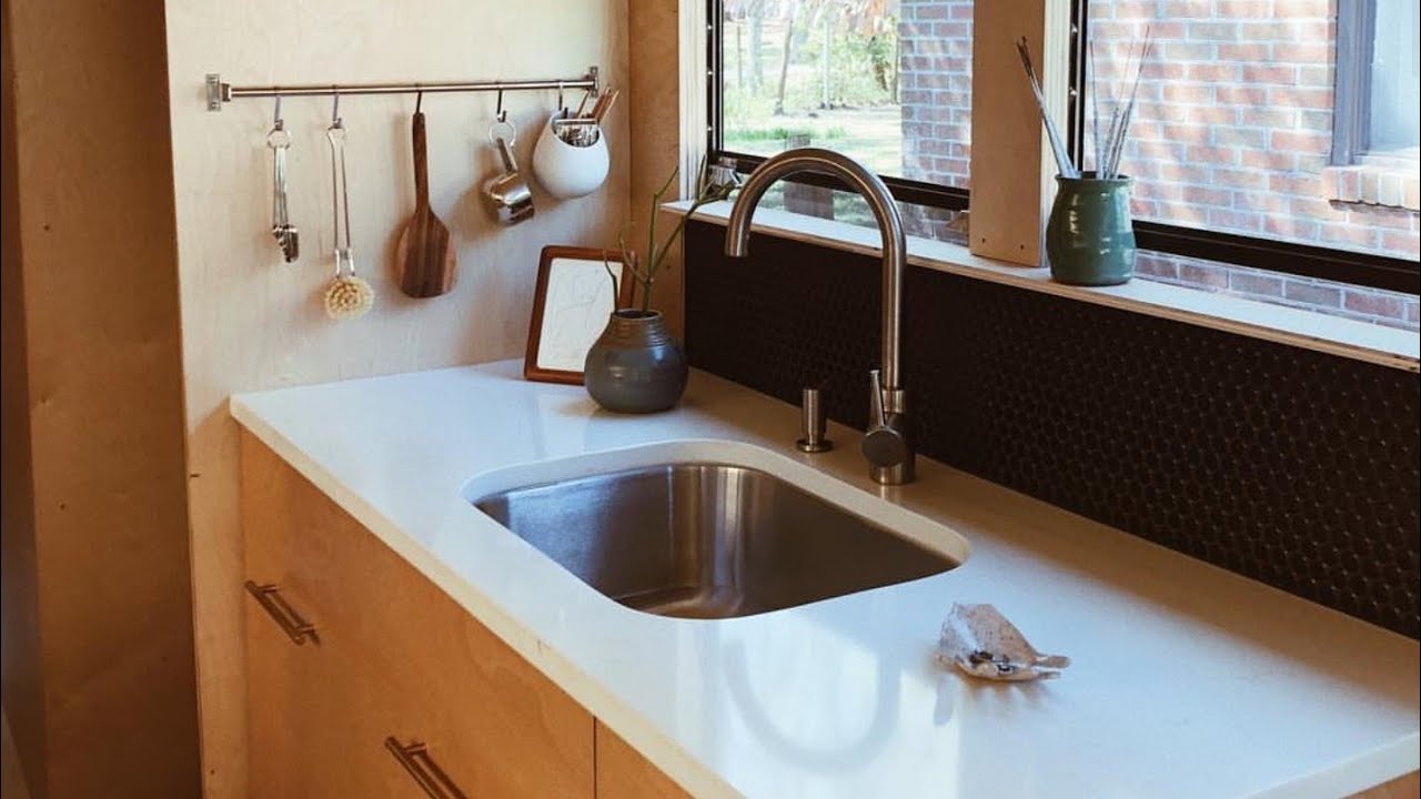 School Bus Tiny House Goes Full Luxury With Penny Tile  Kitchen Backsplash: Skoolie Conversion