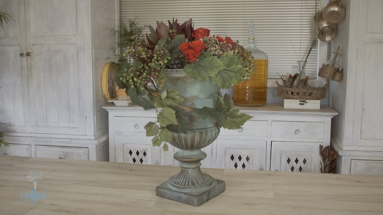 Hydrangea Blooms into a Verdigris Vintage Urn Floristry Arrangement