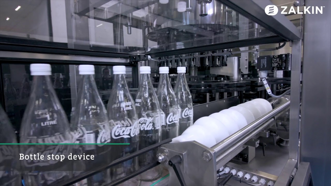 Beverage decapping machine at 48 000 bottles per hour
