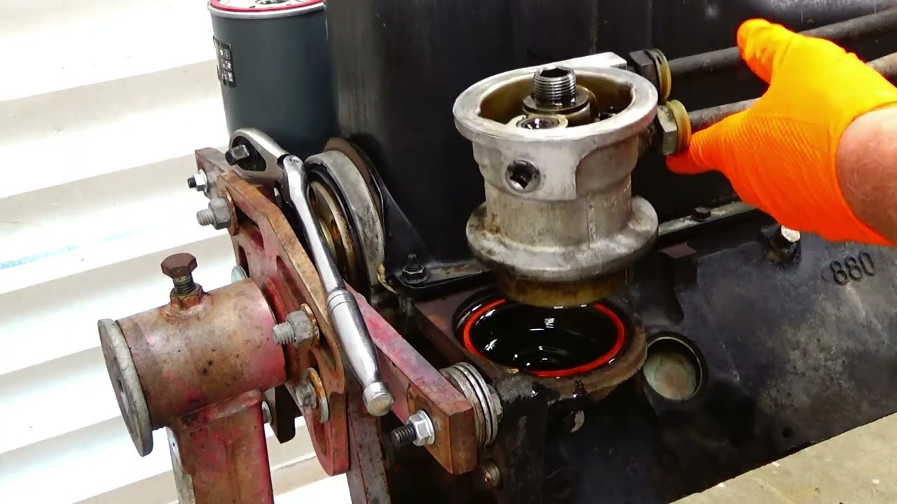 Удалить течь масляного радиатора Chevy 5.7 L