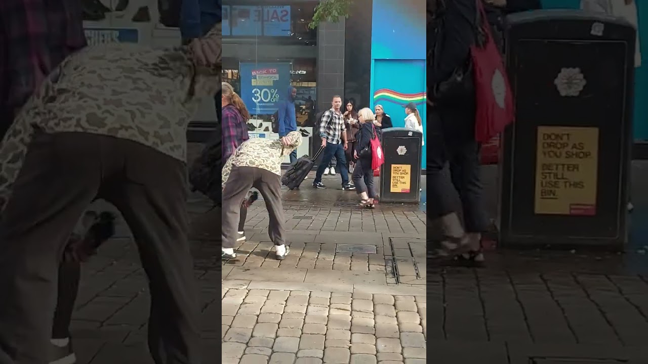 Manchester street preachers  guy torment torture poor pigeon. manage to get the pigeon from him.